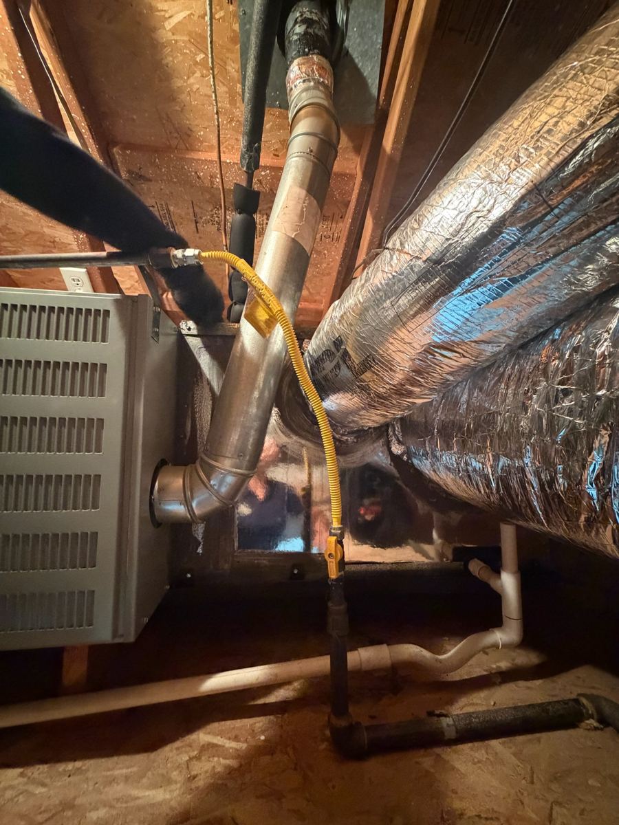 New attic furnace connected to insulated ductwork