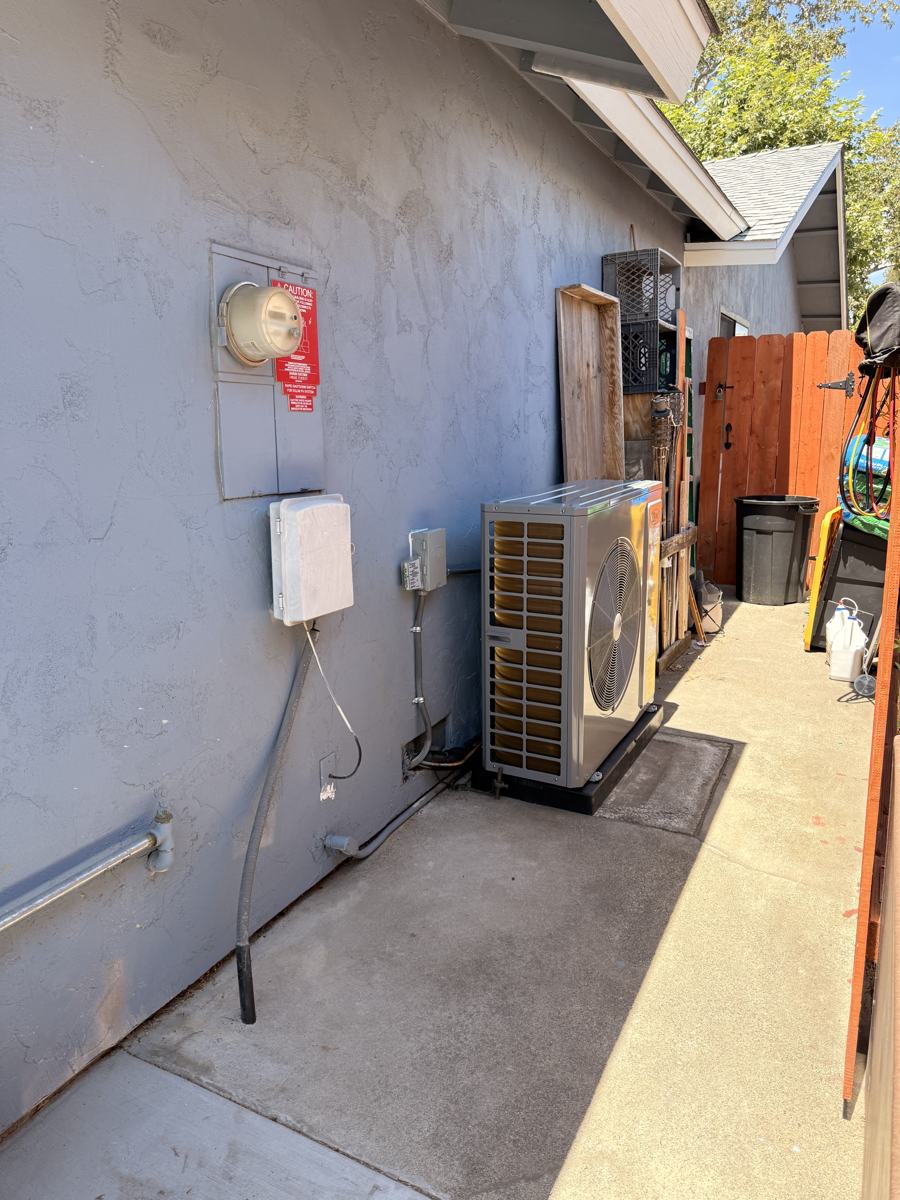 Condenser installed on a second-floor deck