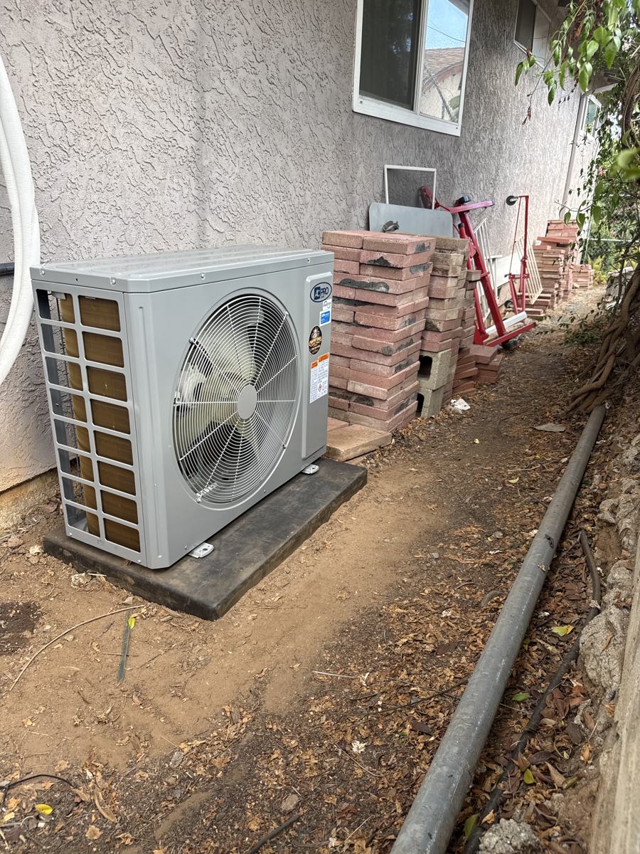 New condenser installed along a fence line in Escondido