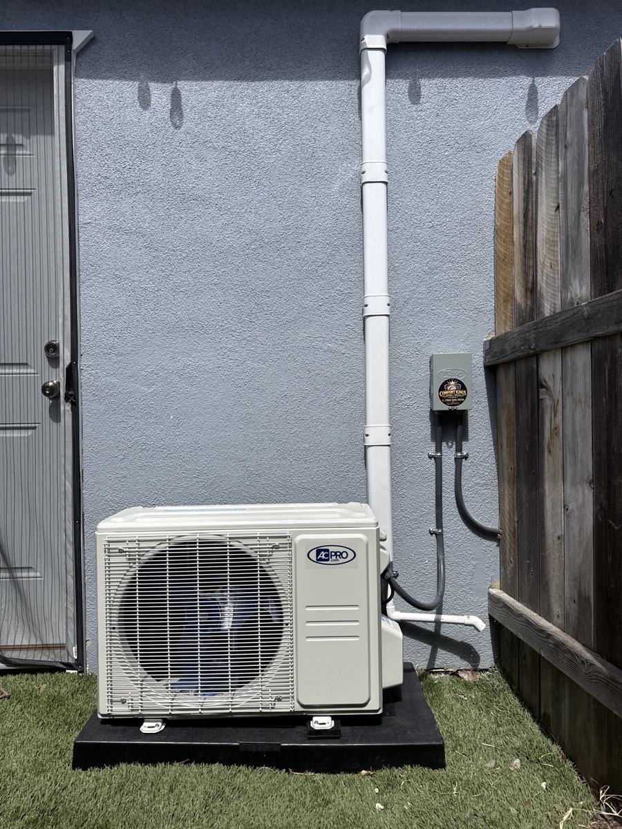 Finished mini-split condenser on a pad in Vista